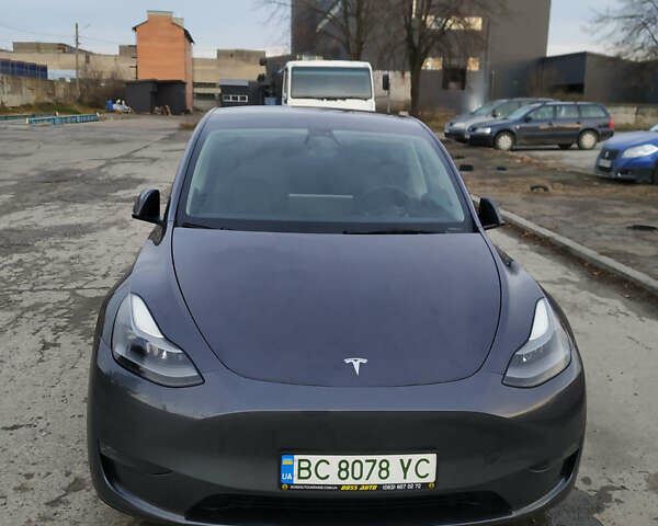 Сірий Тесла Model Y, об'ємом двигуна 0 л та пробігом 74 тис. км за 25999 $, фото 1 на Automoto.ua