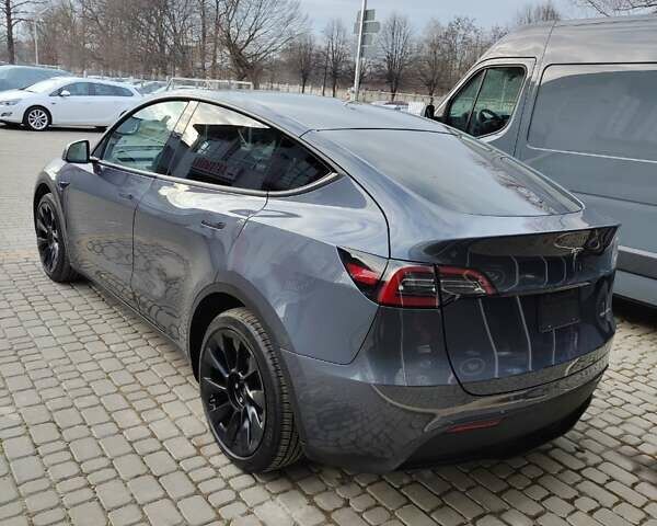 Сірий Тесла Model Y, об'ємом двигуна 0 л та пробігом 50 тис. км за 26490 $, фото 3 на Automoto.ua