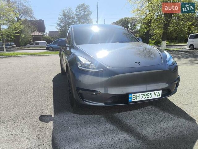 Серый Тесла Model Y, объемом двигателя 0 л и пробегом 77 тыс. км за 30999 $, фото 5 на Automoto.ua