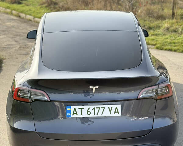 Серый Тесла Model Y, объемом двигателя 0 л и пробегом 84 тыс. км за 22999 $, фото 7 на Automoto.ua
