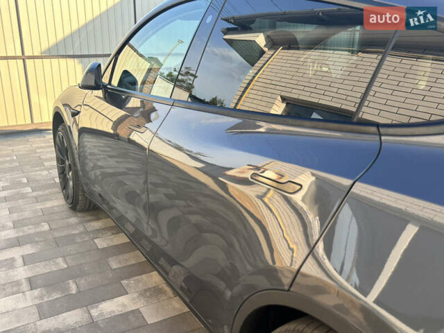 Серый Тесла Model Y, объемом двигателя 0 л и пробегом 65 тыс. км за 29500 $, фото 7 на Automoto.ua