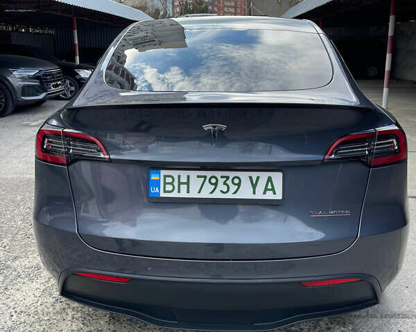 Серый Тесла Model Y, объемом двигателя 0 л и пробегом 65 тыс. км за 27400 $, фото 5 на Automoto.ua