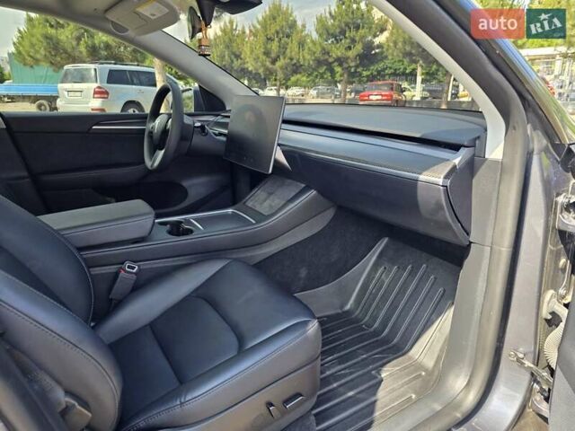 Серый Тесла Model Y, объемом двигателя 0 л и пробегом 34 тыс. км за 27500 $, фото 30 на Automoto.ua
