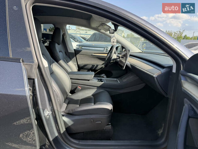 Серый Тесла Model Y, объемом двигателя 0 л и пробегом 31 тыс. км за 24800 $, фото 4 на Automoto.ua