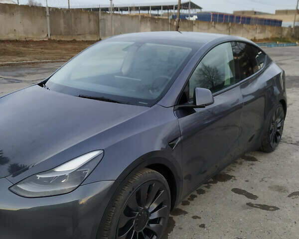 Сірий Тесла Model Y, об'ємом двигуна 0 л та пробігом 74 тис. км за 25999 $, фото 2 на Automoto.ua