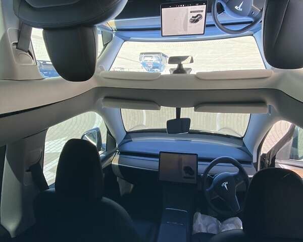 Серый Тесла Model Y, объемом двигателя 0 л и пробегом 32 тыс. км за 27500 $, фото 29 на Automoto.ua