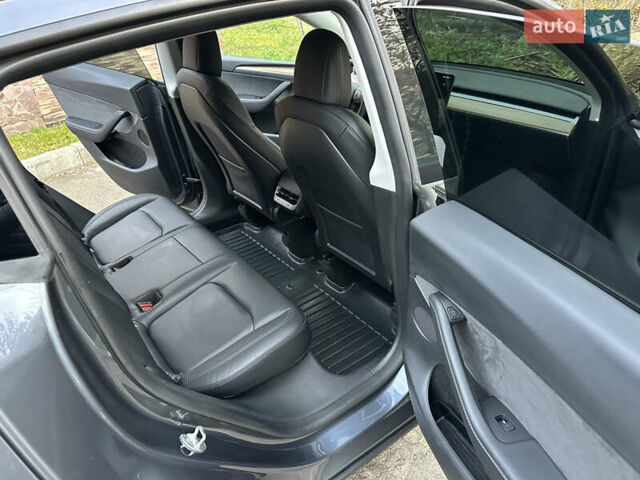 Серый Тесла Model Y, объемом двигателя 0 л и пробегом 95 тыс. км за 24900 $, фото 12 на Automoto.ua
