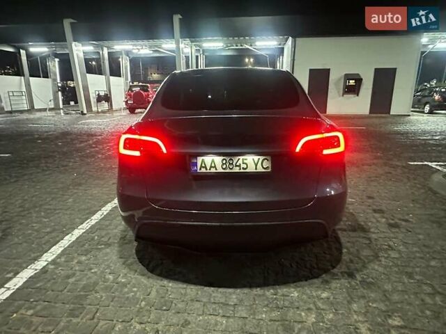 Серый Тесла Model Y, объемом двигателя 0 л и пробегом 64 тыс. км за 28999 $, фото 7 на Automoto.ua