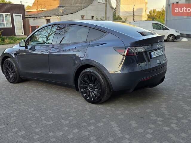 Серый Тесла Model Y, объемом двигателя 0 л и пробегом 77 тыс. км за 25499 $, фото 6 на Automoto.ua