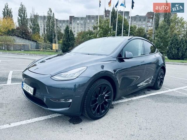 Серый Тесла Model Y, объемом двигателя 0 л и пробегом 61 тыс. км за 25500 $, фото 2 на Automoto.ua