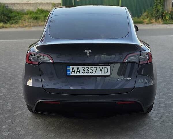 Серый Тесла Model Y, объемом двигателя 0 л и пробегом 77 тыс. км за 25499 $, фото 2 на Automoto.ua