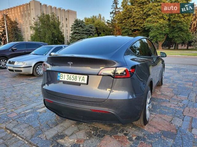 Серый Тесла Model Y, объемом двигателя 0 л и пробегом 49 тыс. км за 26950 $, фото 17 на Automoto.ua