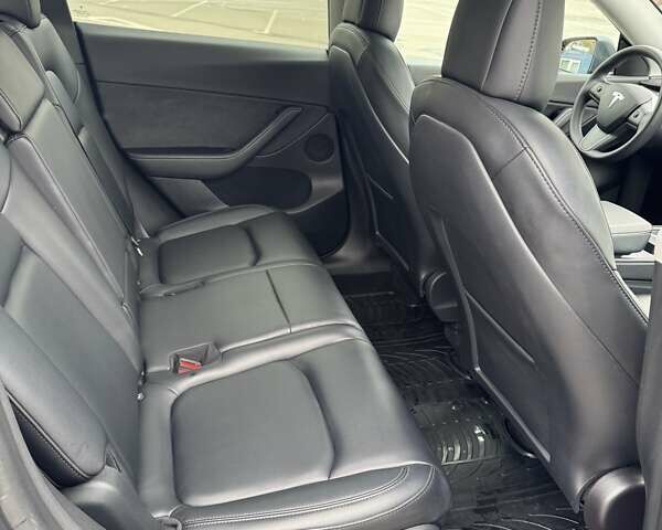 Серый Тесла Model Y, объемом двигателя 0 л и пробегом 61 тыс. км за 25500 $, фото 28 на Automoto.ua