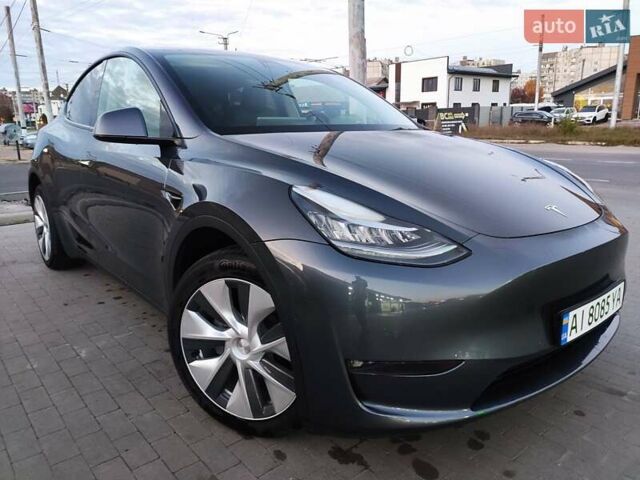 Серый Тесла Model Y, объемом двигателя 0 л и пробегом 74 тыс. км за 26999 $, фото 5 на Automoto.ua