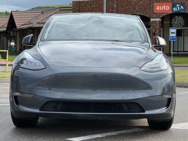 Серый Тесла Model Y, объемом двигателя 0 л и пробегом 27 тыс. км за 27500 $, фото 2 на Automoto.ua