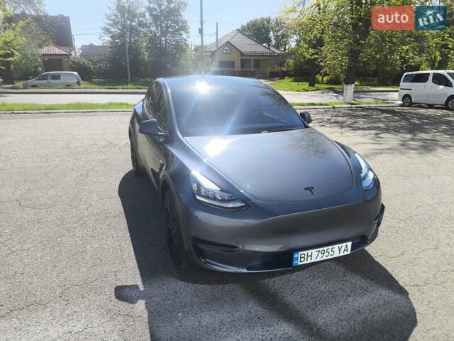 Серый Тесла Model Y, объемом двигателя 0 л и пробегом 77 тыс. км за 30999 $, фото 4 на Automoto.ua