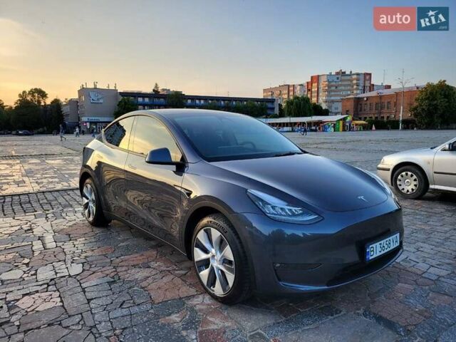 Серый Тесла Model Y, объемом двигателя 0 л и пробегом 49 тыс. км за 26950 $, фото 19 на Automoto.ua