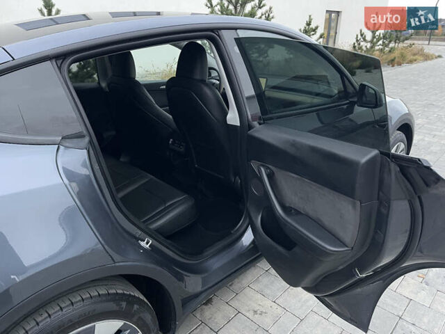 Сірий Тесла Model Y, об'ємом двигуна 0 л та пробігом 65 тис. км за 25500 $, фото 30 на Automoto.ua
