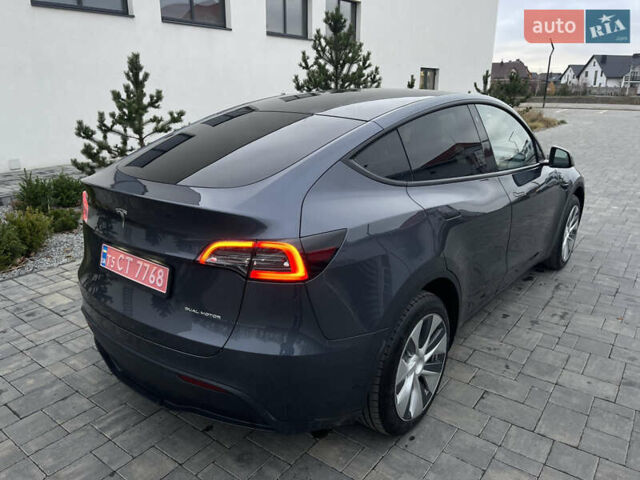 Сірий Тесла Model Y, об'ємом двигуна 0 л та пробігом 65 тис. км за 25500 $, фото 55 на Automoto.ua