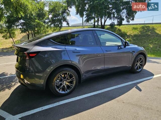 Сірий Тесла Model Y, об'ємом двигуна 0 л та пробігом 29 тис. км за 29900 $, фото 1 на Automoto.ua