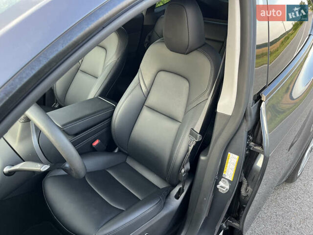 Серый Тесла Model Y, объемом двигателя 0 л и пробегом 27 тыс. км за 28900 $, фото 12 на Automoto.ua