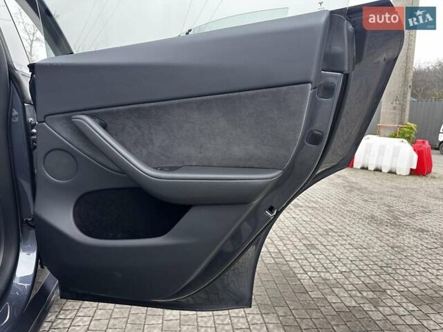 Серый Тесла Model Y, объемом двигателя 0 л и пробегом 24 тыс. км за 28399 $, фото 27 на Automoto.ua