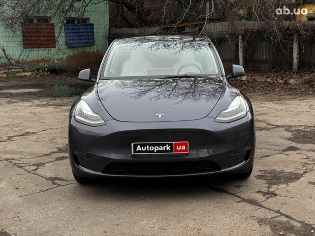 Серый Тесла Model Y, объемом двигателя 0 л и пробегом 22 тыс. км за 25990 $, фото 1 на Automoto.ua