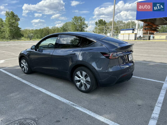 Серый Тесла Model Y, объемом двигателя 0 л и пробегом 9 тыс. км за 28900 $, фото 4 на Automoto.ua