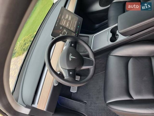 Серый Тесла Model Y, объемом двигателя 0 л и пробегом 19 тыс. км за 27900 $, фото 11 на Automoto.ua
