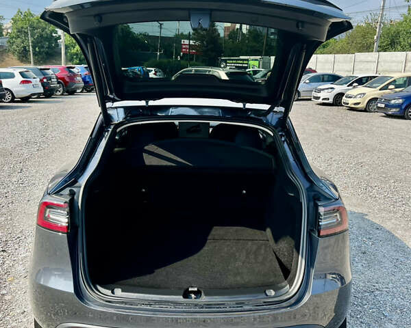 Серый Тесла Model Y, объемом двигателя 0 л и пробегом 11 тыс. км за 36999 $, фото 5 на Automoto.ua