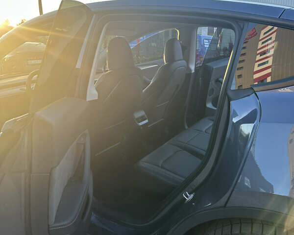 Серый Тесла Model Y, объемом двигателя 0 л и пробегом 55 тыс. км за 30800 $, фото 7 на Automoto.ua