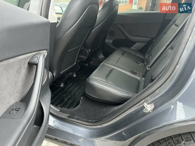 Серый Тесла Model Y, объемом двигателя 0 л и пробегом 56 тыс. км за 28001 $, фото 3 на Automoto.ua