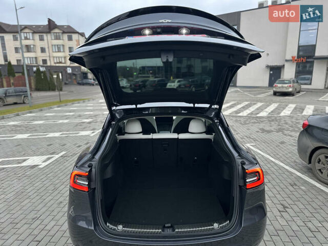 Сірий Тесла Model Y, об'ємом двигуна 0 л та пробігом 26 тис. км за 25999 $, фото 66 на Automoto.ua
