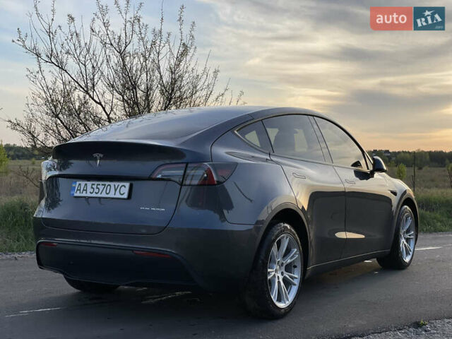 Серый Тесла Model Y, объемом двигателя 0 л и пробегом 13 тыс. км за 32300 $, фото 1 на Automoto.ua
