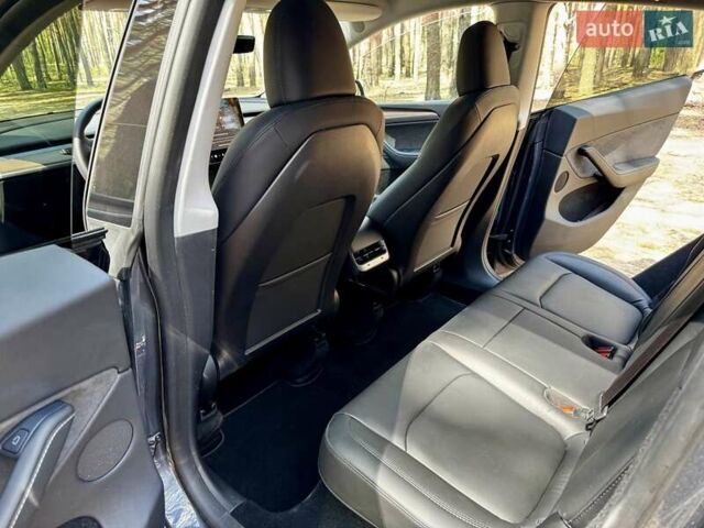 Серый Тесла Model Y, объемом двигателя 0 л и пробегом 15 тыс. км за 27100 $, фото 14 на Automoto.ua