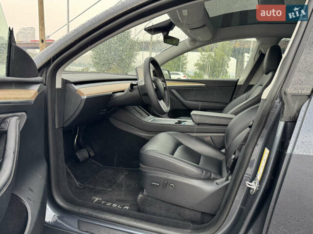 Серый Тесла Model Y, объемом двигателя 0 л и пробегом 66 тыс. км за 27900 $, фото 13 на Automoto.ua