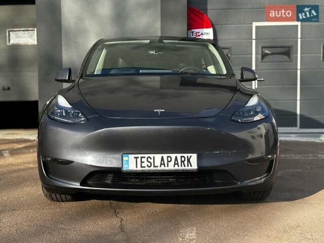 Сірий Тесла Model Y, об'ємом двигуна 0 л та пробігом 27 тис. км за 28999 $, фото 1 на Automoto.ua