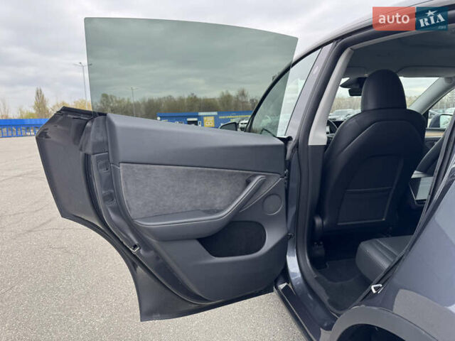 Серый Тесла Model Y, объемом двигателя 0 л и пробегом 10 тыс. км за 27900 $, фото 32 на Automoto.ua