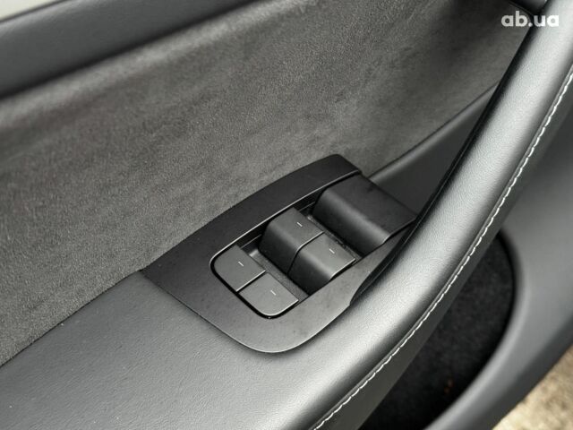 Серый Тесла Model Y, объемом двигателя 0 л и пробегом 22 тыс. км за 25990 $, фото 20 на Automoto.ua