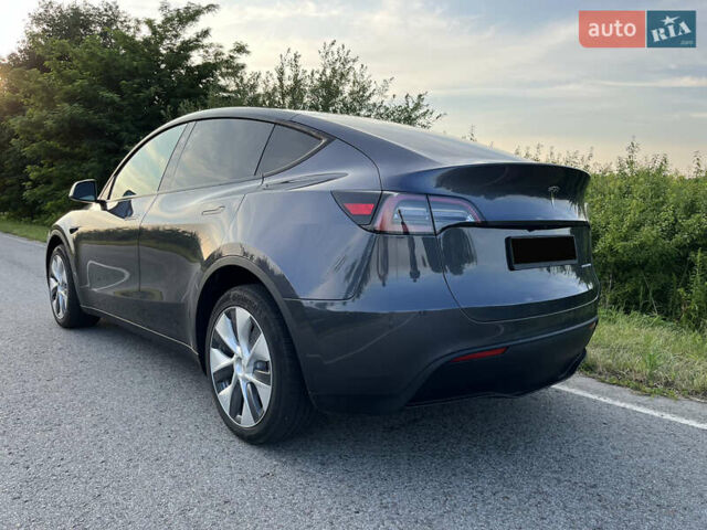Серый Тесла Model Y, объемом двигателя 0 л и пробегом 27 тыс. км за 28900 $, фото 6 на Automoto.ua
