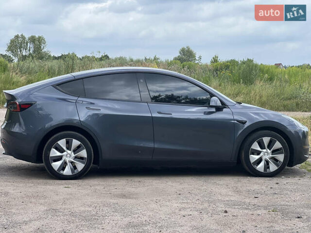 Серый Тесла Model Y, объемом двигателя 0 л и пробегом 40 тыс. км за 29990 $, фото 1 на Automoto.ua