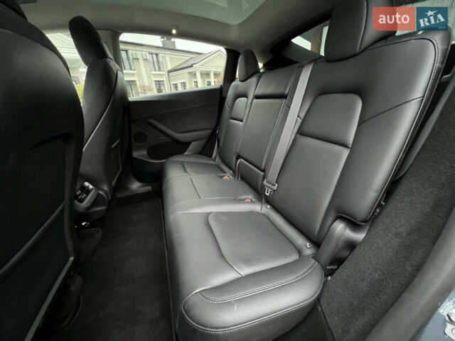 Серый Тесла Model Y, объемом двигателя 0 л и пробегом 52 тыс. км за 27499 $, фото 20 на Automoto.ua