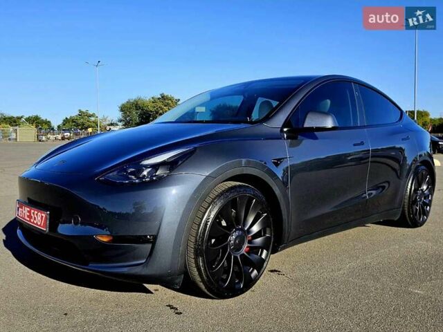 Серый Тесла Model Y, объемом двигателя 0 л и пробегом 29 тыс. км за 27900 $, фото 3 на Automoto.ua