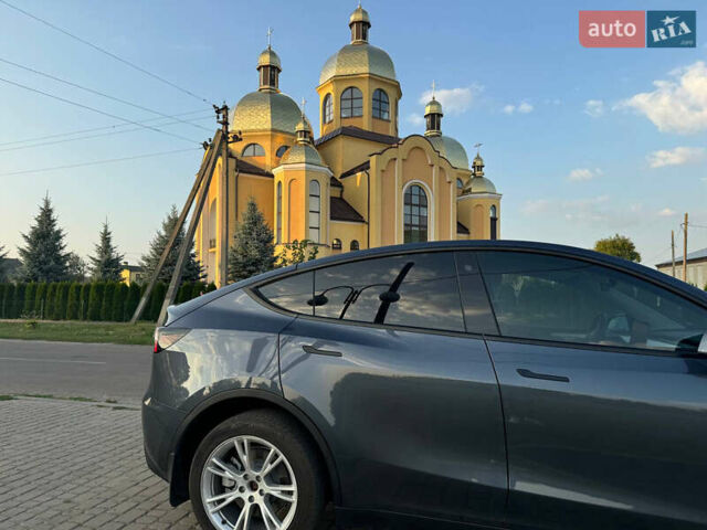 Серый Тесла Model Y, объемом двигателя 0 л и пробегом 31 тыс. км за 36500 $, фото 1 на Automoto.ua