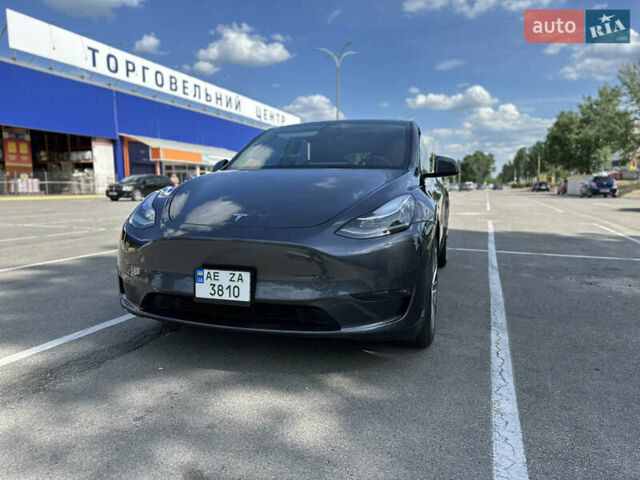 Серый Тесла Model Y, объемом двигателя 0 л и пробегом 9 тыс. км за 28900 $, фото 1 на Automoto.ua