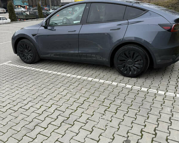 Серый Тесла Model Y, объемом двигателя 0 л и пробегом 64 тыс. км за 27300 $, фото 6 на Automoto.ua