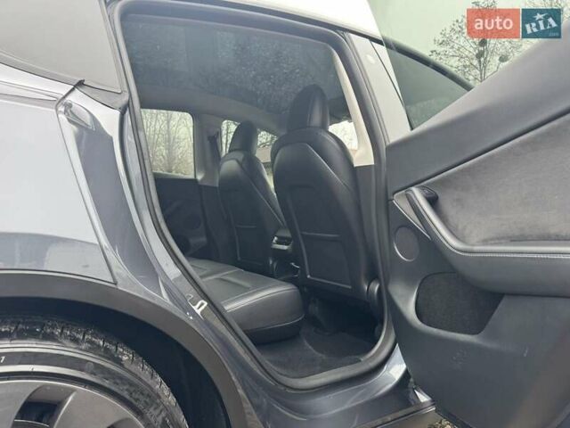 Серый Тесла Model Y, объемом двигателя 0 л и пробегом 44 тыс. км за 28900 $, фото 26 на Automoto.ua