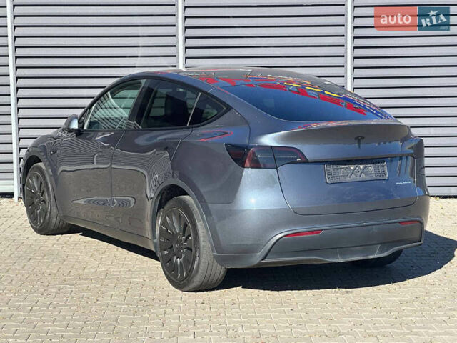 Серый Тесла Model Y, объемом двигателя 0 л и пробегом 93 тыс. км за 27900 $, фото 8 на Automoto.ua