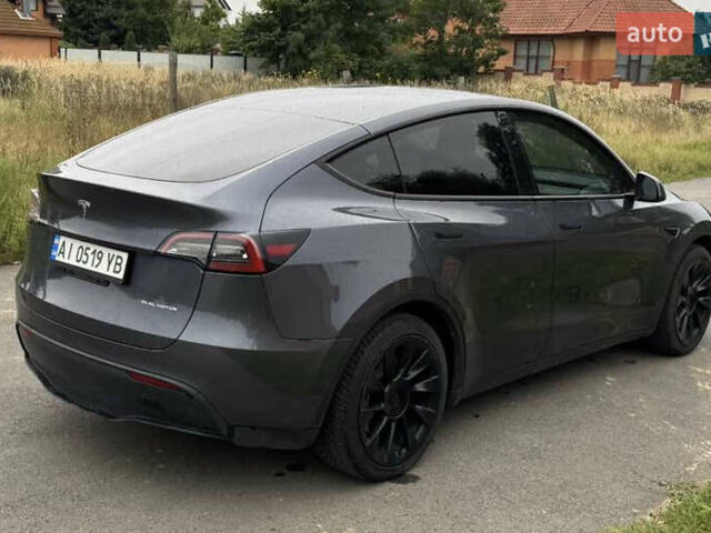 Серый Тесла Model Y, объемом двигателя 0 л и пробегом 57 тыс. км за 31333 $, фото 1 на Automoto.ua