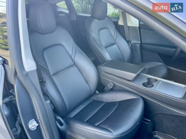 Серый Тесла Model Y, объемом двигателя 0 л и пробегом 21 тыс. км за 25300 $, фото 19 на Automoto.ua